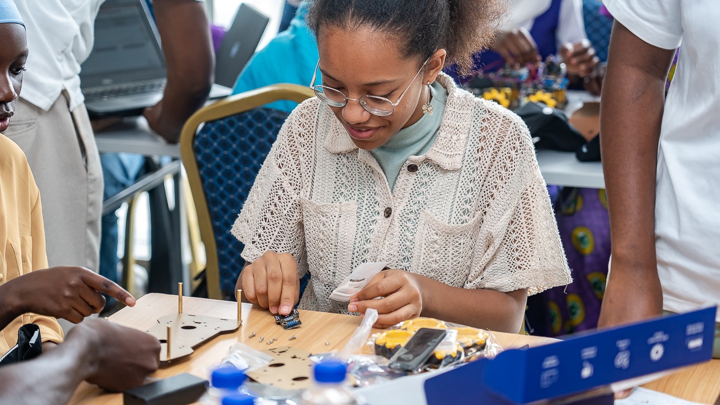 A student working on a robotics challenge at the STEM School in Dakar, Senegal .